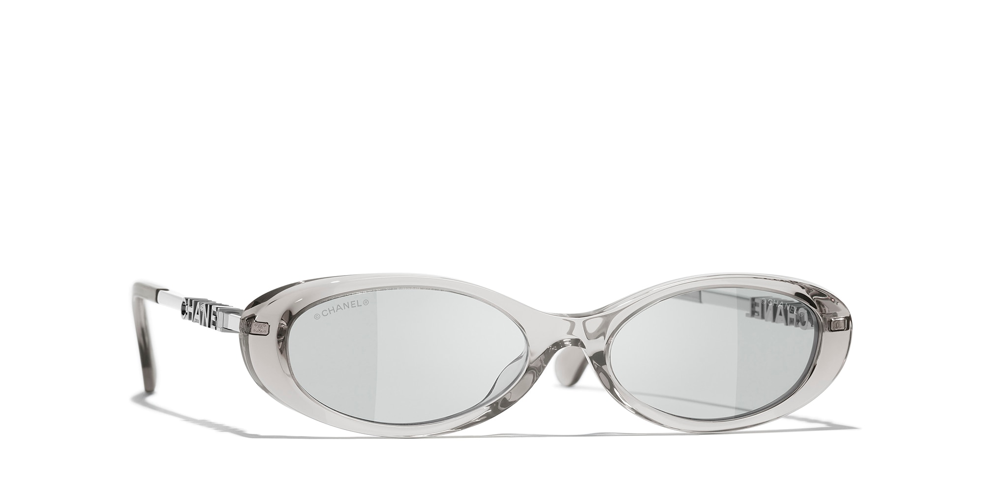 Chanel Woman Sunglass Oval Sunglasses CH5565 CH5565 -  Frame color: Transparent Grey, Lens color: Pale Grey